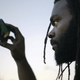 Kevin Moore films police activity in the film Copwatch. (Adriel Gonzalez)